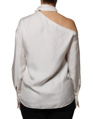 Blusa Brunello Cucinelli de seda bege com gola Ascot e mangas compridas