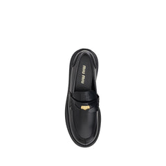 Mocassins de couro Miu Miu