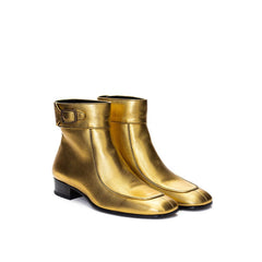 Bota de couro dourada Saint Laurent