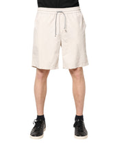 Bermuda masculina com logo off-white Brunello Cucinelli e shorts de moletom