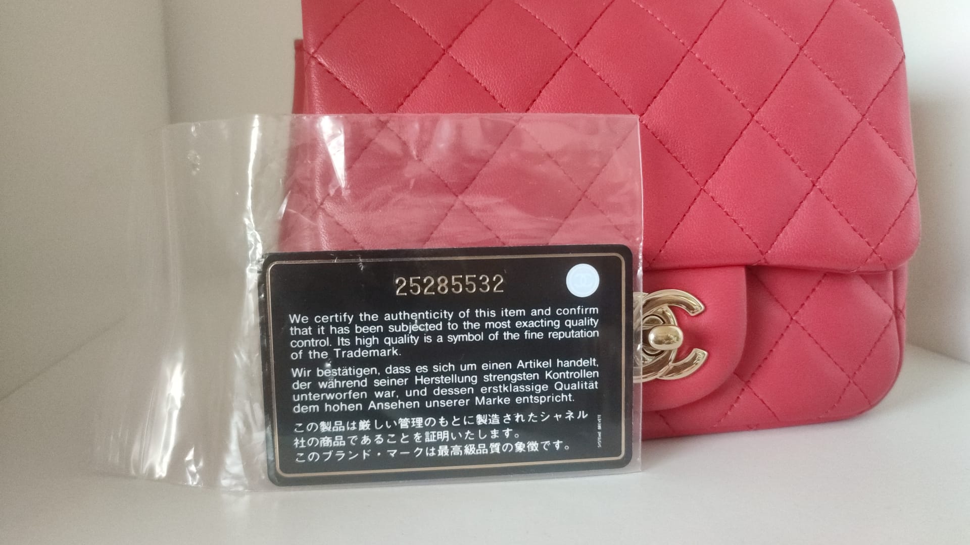 Bolsa Chanel Mini em Pele de Cordeiro com Corrente e Ombro Rosa Matelassê
