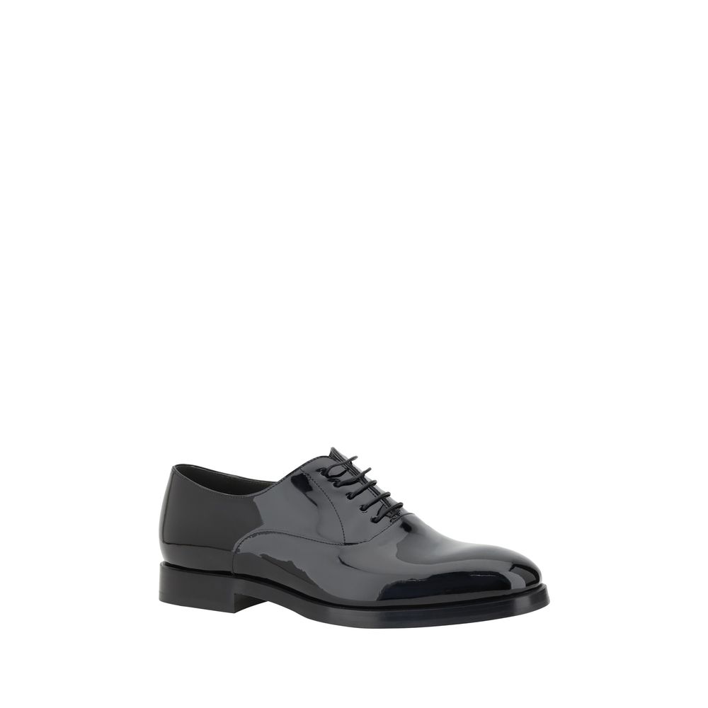 Brunello Cucinelli Sapatos de couro envernizado com cadarço