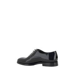 Brunello Cucinelli Sapatos de couro envernizado com cadarço