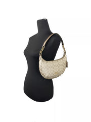 Bolsa de ombro Coach Payton Signature em couro PVC champanhe dourado