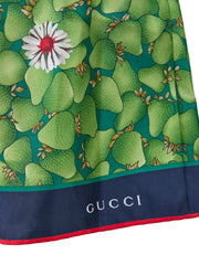 Shorts de seda com estampa floral verde da Gucci