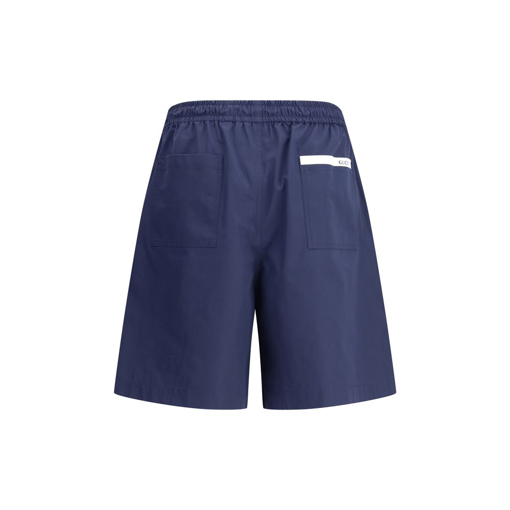 Shorts com logotipo da Gucci