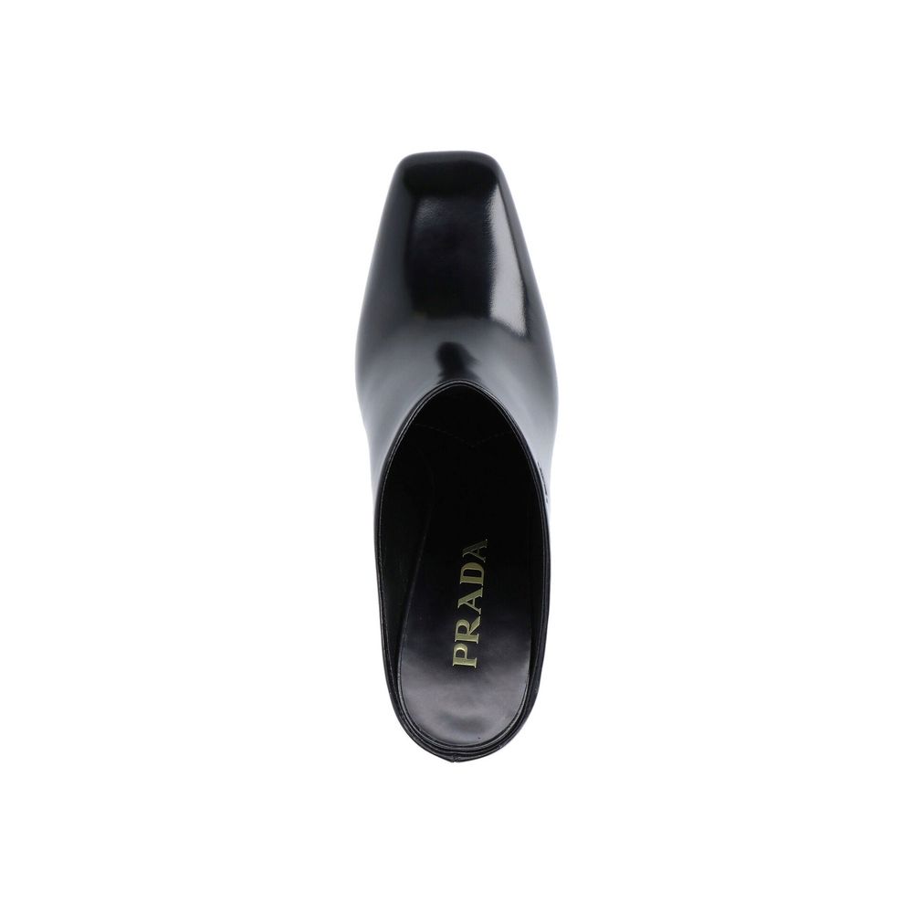 Mulas Prada de couro com logotipo